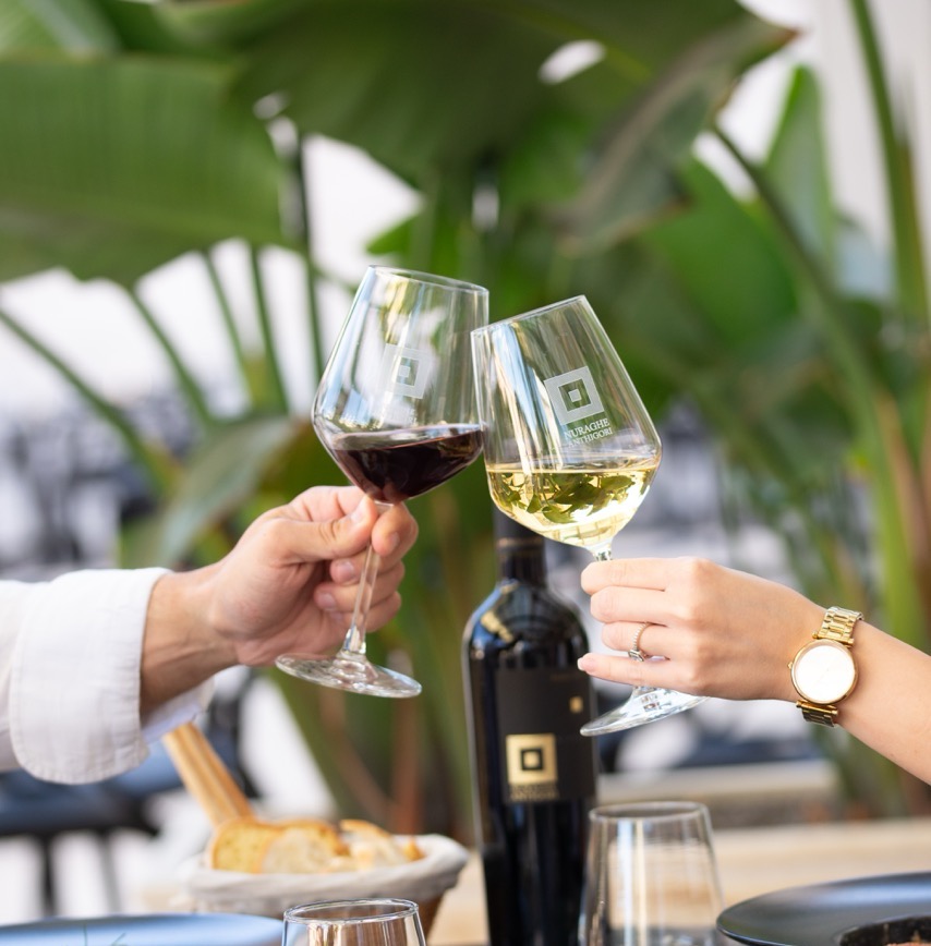 Wine toast with red and white wine glasses